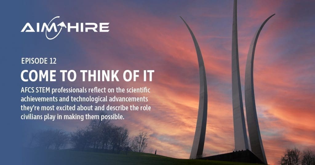 Aim Hire Episode 12: Com to Think of It. AFCS STEM professionals reflect on the scientific achievements and technological advancements they're most excited about and describe the role civilians play in making them possible. A sculpture of three tall curved prongs extend into the sky.