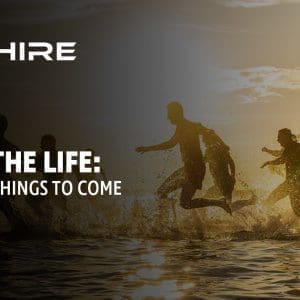 Aim Hire Episode 16: Living the Life: A Taste of Things to Come. A Group of people running in a body of water.