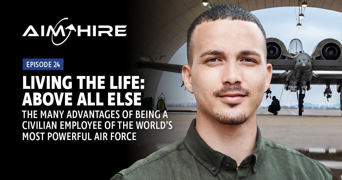 Aim Hire Episode 24: Living the Life: Above All Else, a Man in a green shirt front of a jet in a hangar.