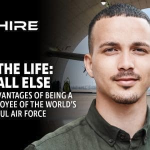Aim Hire Episode 24: Living the Life: Above All Else, a Man in a green shirt front of a jet in a hangar.