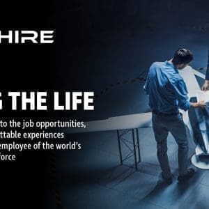 Aim Hire Episode 28: Living the Life, a woman and a man looking at a model of a jet and it's plans.